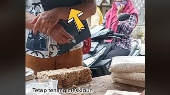 Terekam Bawa Dokumen Penting Saat Beli Tempe, Warganet: Tetap Tenang di Era Gempuran Ayang