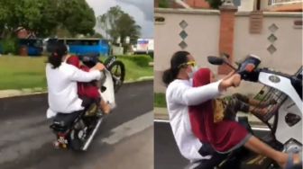 Main Aksi Motor 'Wheelie' dengan Balita, Ayah ini Banjir Kecaman Warganet: Jangan Mainkan Nyawa Anak!