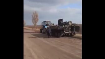 Begini Cara Berperang Para Petani Ukraina Hadapi Gempuran Rusia, Curi Tank Militer Gunakan Traktor
