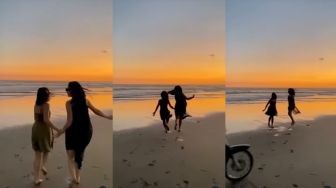 Kocak! 2 Cewek Lagi Bikin Video Lari-lari Cantik Berlatar Langit Senja di Pantai, Eh Mendadak Ada 'Iklan' Lewat