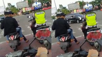 Pemotor Tak Pakai Helm Santai Ngobrol Bareng Polisi, Warganet Ketar-ketir: Gue Kok Ikutan Merinding