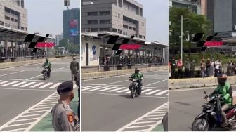 Viral Driver Ojol di Parade MotoGP, Disoraki Malah Lambaikan Tangan