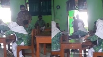 Diingatkan Guru Karena Main Game saat Ujian, Siswa Ini Malah Sesumbar Keluar Pukul Pintu, Warganet: Halal Ditabok