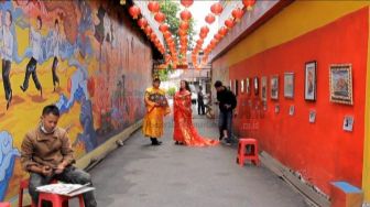 Objek Swafoto, Destinasi Wisata Pecinan Pontianak Chinatown Indonesia Bikin Pameran Lukisan yang Terpajang di Tembok