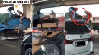 Aksi Bajing Loncat, Ambil Besi dari Truk Barang di Siang Bolong, Tetap Nekat Nyolong Meski Ada Mobil Polisi