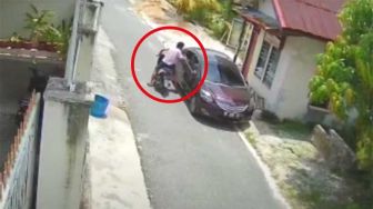 Terekam CCTV, Pencurian Modus Pecah Kaca Mobil pada Siang Hari di Pekanbaru