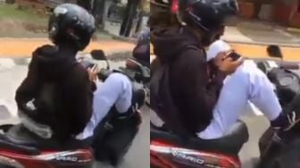 Viral Pelajar Kendarai Motor Sambil Main Game dan Nyetir Pakai Kaki