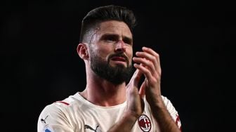 Pemain depan AC Milan Olivier Giroud bereaksi selama pertandingan sepak bola Serie A Italia antara Torino melawan AC Milan di Stadion Olimpiade di Turin, Senin (11/4) dini hari WIB.  MARCO BERTORELLO / AFP