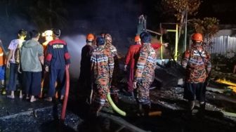 Bujang Nato Nekat Terobos Api Demi Selamatkan Anak Tetangga yang Sedang Tertidur Pulas di dalam Rumah yang Terbakar