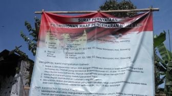 Viral Banner Permohonan Maaf Tetangga Julid, Terpampang Nyata Usai Tuduh Orang Pesugihan Tuyul