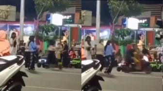 Duh! Gegara Tiga Cewek Joget di Tengah Jalan, Kendaraan Melintas Jadi Terhambat