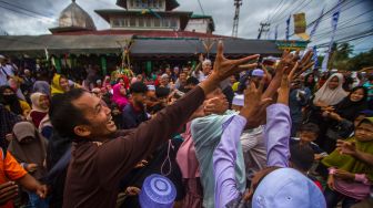 Tradisi Bantungbam Apam Suku Banjar di Kalimantan Selatan