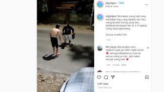 Pria Ini Evakuasi Kucing yang Tertabrak di Tengah Jalan, Aksinya Bikin Netizen Luluh