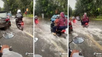 Duh! Pemotor Menyalip di Jalan Banjir dan Cipratkan Air Kemana-mana, Pas Ditegur Malah Acungkan Jari Tengah