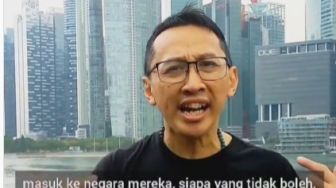 Berada di Singapura, Abu Janda Minta Indonesia Tegas dalam Menindak Orang yang Terpapar Radikalisme