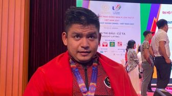 Atlet Angkat Besi Zul Ilmi Raih Medali Emas di SEA Games 2021