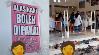 Tak Baca Peraturan, Pengunjung Ini Malah Lepas Sandal di Dalam Toko