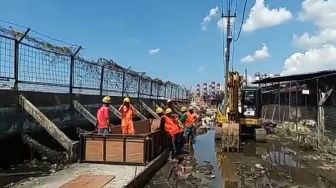 Info Hoaks Tanggul Darurat Jebol, Karyawan Sekitar Pelabuhan Tanjung Emas Semarang Kalang Kabut