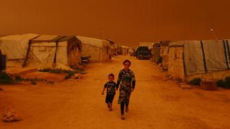 Badai Pasir Ubah Langit Suriah Jadi Kuning