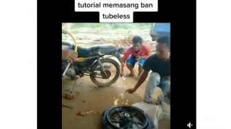 Ikuti Tutorial Praktis Pasang Ban ke Pelek Motor di Sosial Media, Pria Ini Malah Syok Usai Praktik