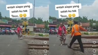 Palang Pintu Sudah Ditutup, Nenek Ini Jalan Santai lewati Rel Kereta