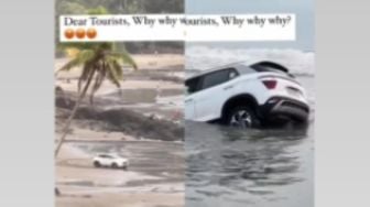 Turis Nekat Bawa Mobil ke Pantai di Bali, Endingnya Malah Nyungsep