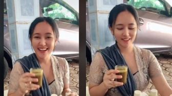 Viral Cewek Cantik Tawarkan Minuman Jamu, Publik Kesengsem Lihat Penampilannya