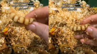 Asyik Makan Nasi Rames, Warganet Malah Temukan Gigi Palsu