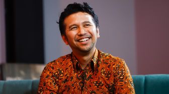 Wakil Gubernur Jawa Timur Emil Elestianto Dardak saat berkunjung ke Kantor Suara.com di Kuningan, Jakarta Selatan, Rabu (29/6/2022). [Suara.com/Alfian Winanto]