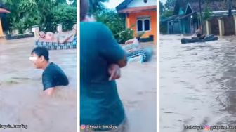 Tetap Bahagia di Tengah Derita, Video Viral Bapak-bapak Asyik Rebahan di Kasur yang Dihanyutkan Banjir