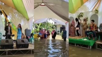 Tetap Gelar Hajatan Meski Terendam Banjir Setinggi Paha, Tamu Nekat Datang sampai Biduan Asik Dangdutan