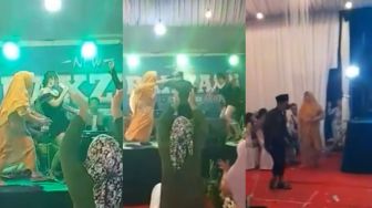 Viral Bapak-Bapak Dilabrak Istri saat Asyik Joget dan Nyawer Biduan di Atas Panggung, Sandal Melayang!