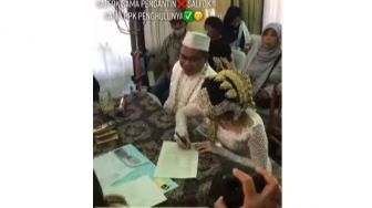 Viral Video Akad Nikah Pasutri, Sosok Penghulu Masih Muda Bikin Salfok Mata