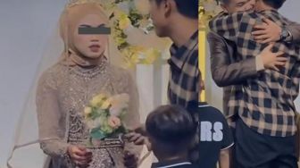 Video Viral Lelaki Bersama Anaknya Datang ke Pernikahan Mantan Istri, Ketegaran Keduanya Jadi Sorotan
