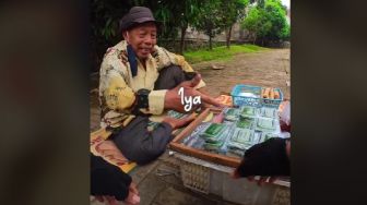 Video Viral Pria Asal Menes Pandeglang Borong Dagangan Kakek di Pinggir Jalan Banjir Pujian: Sehat-sehat Orang Baik