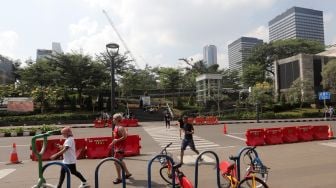 Suasana di Kawasan Sudirman, Dukuh Atas, Jakarta, Jumat (29/7).  [Suara.com/Oke Atmaja]