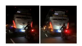 Cara Berkendara Pemotor di Belakang Bus Jadi Sorotan Publik, Cukup Membahayakan