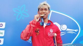 Keren! Jendi Pangabean Berhasil Gondol Tiga Medali Emas Para-Renang di Hari Ketiga APG 2022