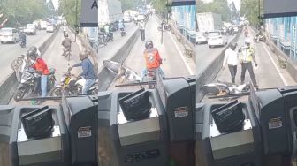 Video Viral Pengendara Sepeda Motor Ditilang Polisi Gara-Gara Lewat Jalur Transjakarta, Publik: Apes Deh