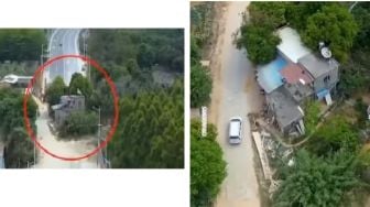 Viral Rumah Berdiri Kokoh di Tengah Jalan Bikin Publik Geleng-Geleng Kepala, Kok Bisa Gak Digusur?