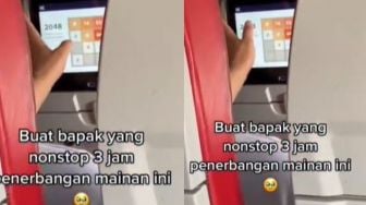 Gegara Naik Pesawat 3 Jam, Bapak-Bapak Ini Ketagihan Main Game 2048