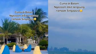 Nongkrong di Tepi Pantai, Warganet Ini Bisa Lihat Negara Singapura