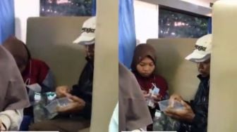 Bikin Iri, Ayah Ini Suapi Sang Putri yang Sudah Remaja Saat Naik Kereta Api