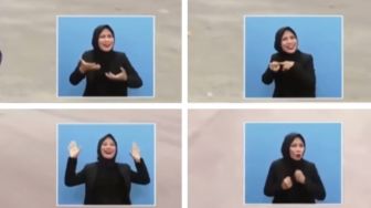 Viral Mimik Impresif Juru Bahasa Isyarat Saat Ojo Dibandingke Goyang Istana Negara, Warganet: Full Senyum Mbaknya