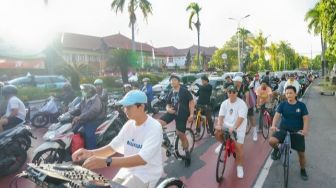 Naik Sepeda Modifikasi Rp 50 Jutaan Keliling Kota, DJ Asal Bali Ini Hibur Masyarakat