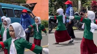 Ikut Lomba Gerak Jalan, Cara Bocah Ini Melangkah Bikin Warganet Salfok