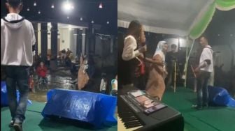 Tak Terima Suami Ikutan Joget, Istri Datangi Biduan Ngamuk di Panggung, Warganet: Kan Lakinya yang Salah