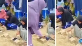 Viral Video Santriwati Nangis Kejer Saat Diminta Hancurkan HP Sendiri Pakai Batu, Tuai Pro Kontra: Ingat Perjuangan Ortu