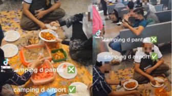 Bak Piknik, Satu Keluarga Gelar Tikar di Bandara sampai Hidangkan Makanan Lauk Pauk dan Sepanci Nasi