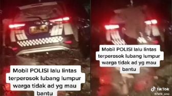 Viral Video Warga Tak Ada yang Bantu Saat Mobil Polisi Terjebak Lumpur, Warganet: Takut Malah Jadi Tersangka